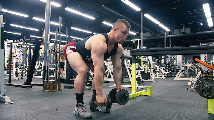 Man performing dumbbell rows